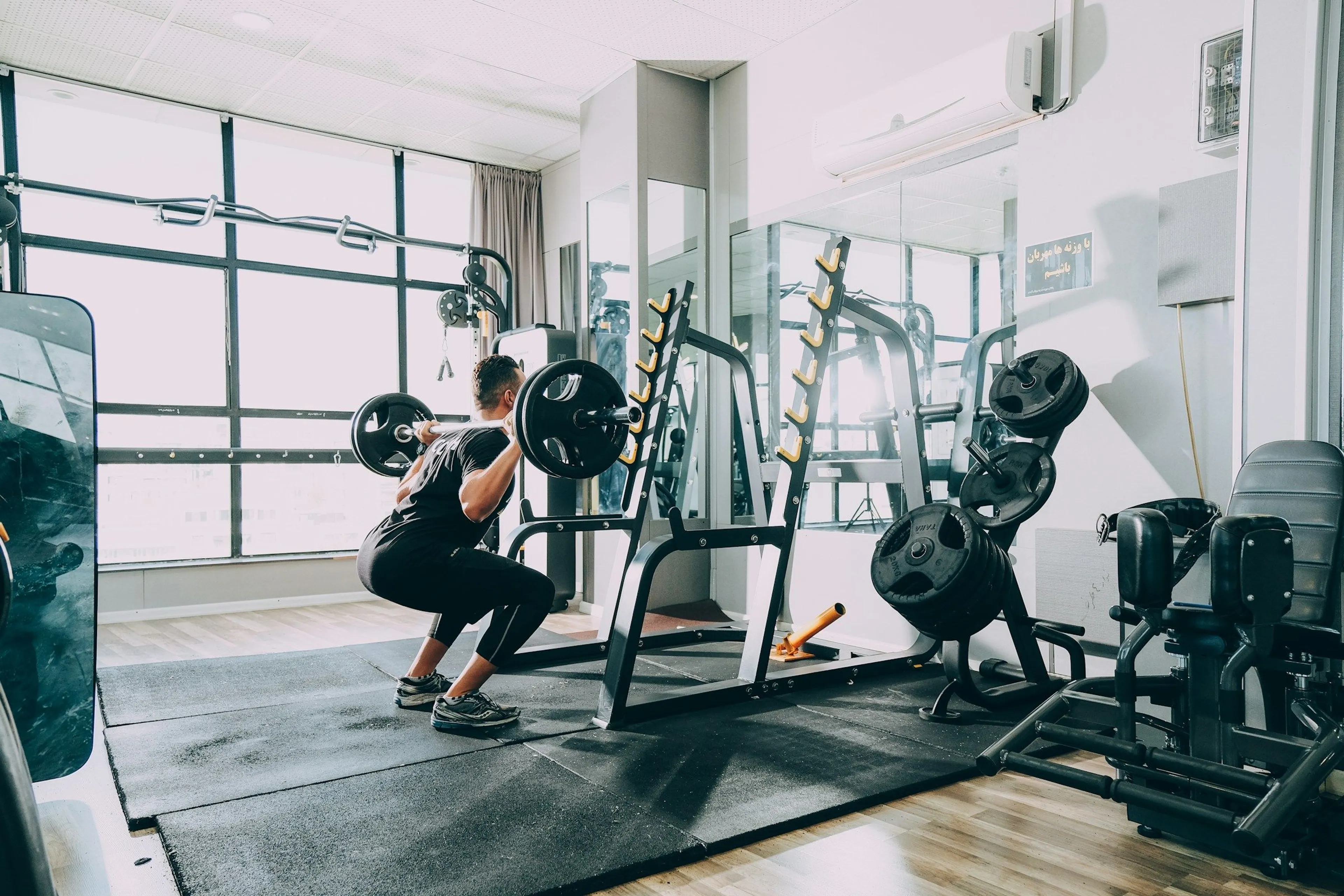 Person Doing Squats